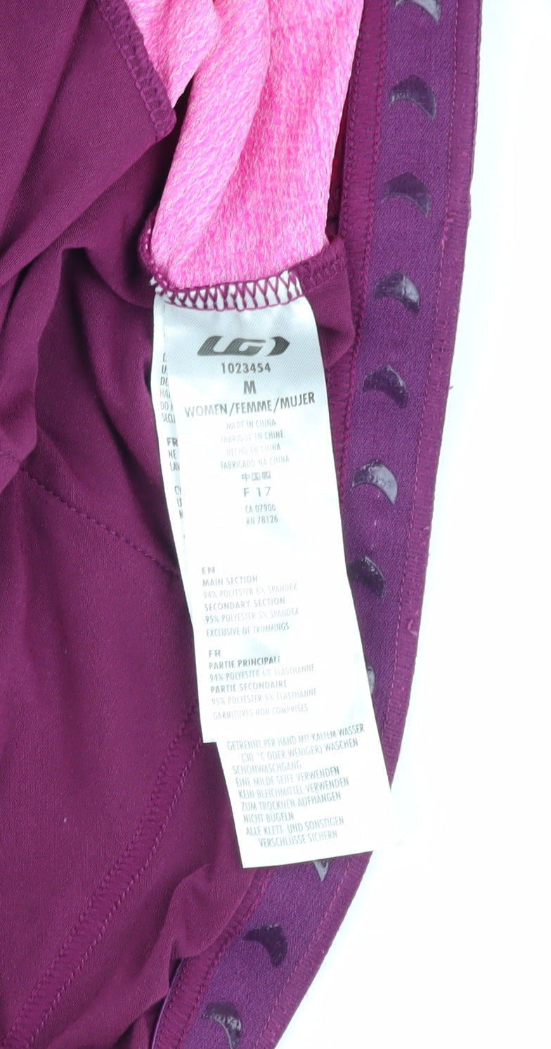 Brand and care label for Louis Garneau Women's Purple Cycling Jacket M
