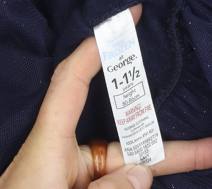 Brand and care label for George girls’ blue frozen jumper 12-18 months