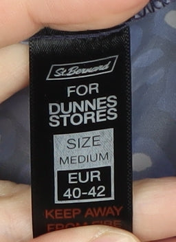 Brand and care label for St. Bernard Blue Animal Print Rain Jacket 12-14