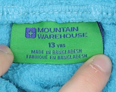 Brand and care label for Mountain Warehouse boys’' blue 13 years hooded fleece hoodie