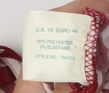 Brand and care label for Kaliko Women's Red Polka Dot Wrap Blouse, size 18