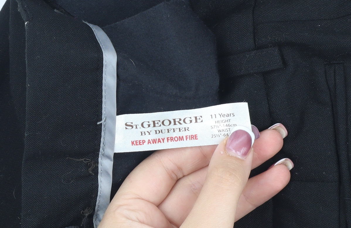 Close-up detail of St.George boys’ black trousers 11 years flame-resistant