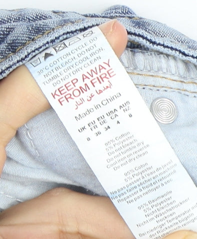 Brand and care label for PRETTYLITTLETHING Petite Blue Boyfriend Jeans, size 8