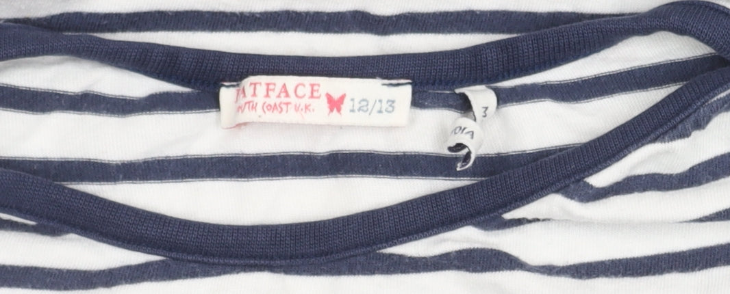 Brand and care label for FatFace girls’ blue white striped long sleeve t-shirt, size 12-13