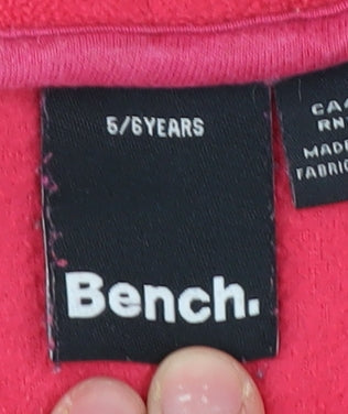 Brand and care label for Bench Red girls’ fleece jacket - 5-6 years