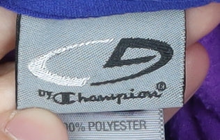 Brand and care label for Champion girls’ purple 1/4 zip fleece sweatshirt l