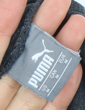 Close-up detail of Puma Women's Black Sports Leggings Gym Trousers, size 12