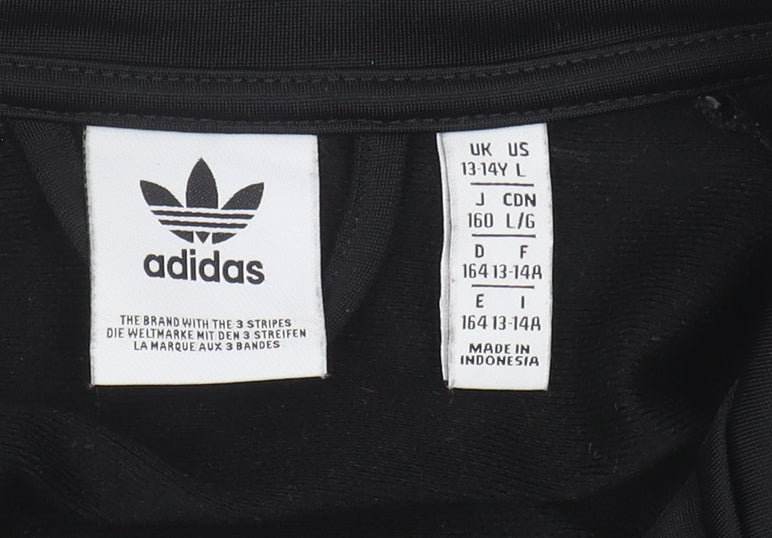 Brand and care label for Adidas boys’ black track jacket 13-14 years sports casual