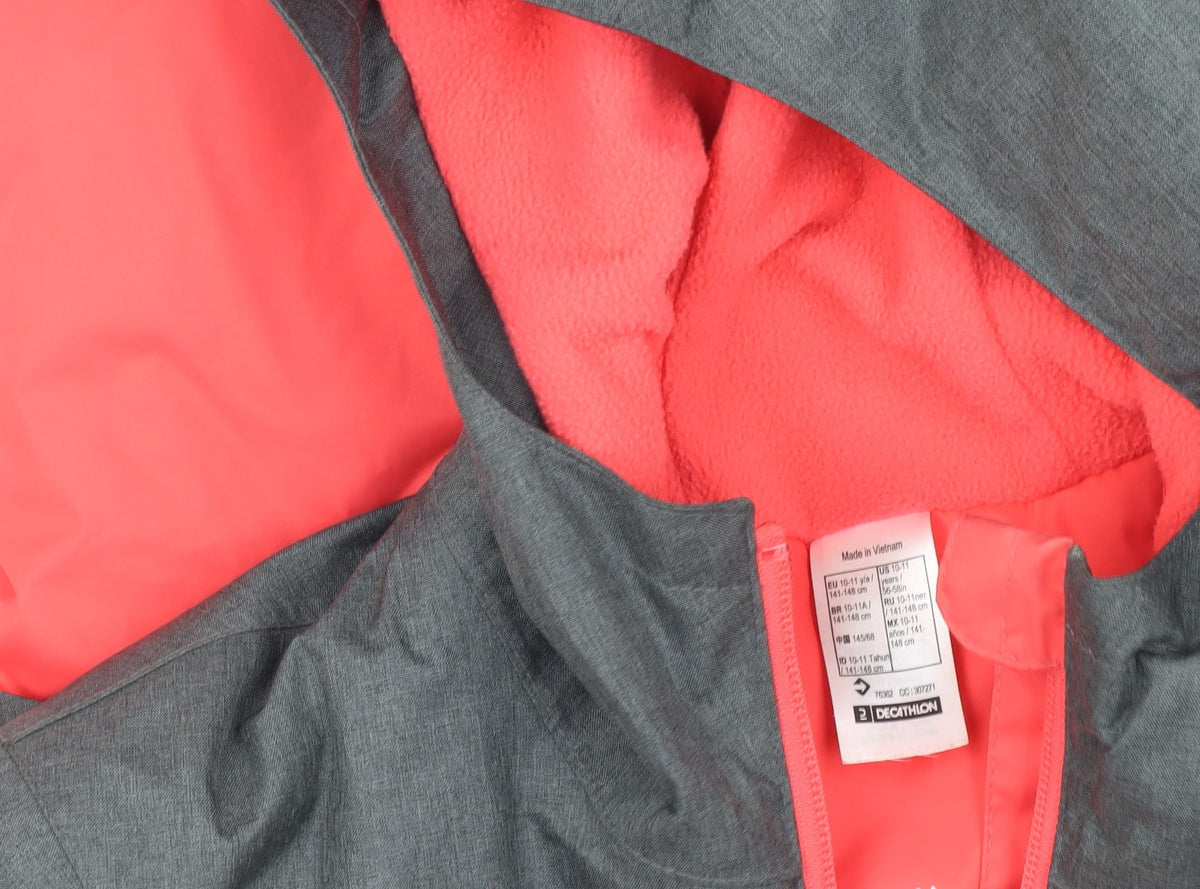 Close-up detail of Quechua girls’ red and grey puffer jacket, size 10-11, years
