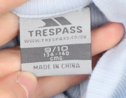 Brand and care label for Trespass girls’ blue 1/4 zip sweatshirt, 9-10 years, activewear