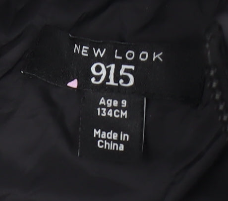 Brand and care label for New Look boys’ black nylon puffer jacket, size 9, years
