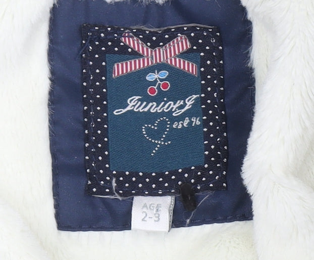 Brand and care label for Junior J girls’ blue hooded puffer jacket 2-3 years