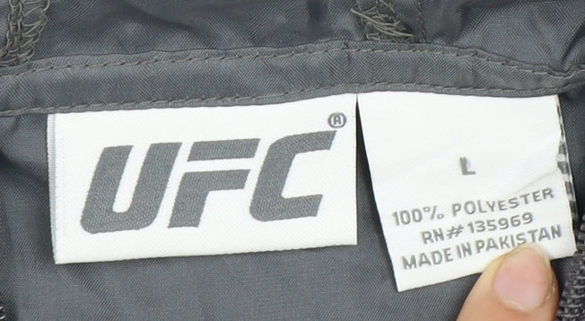 Close-up detail of UFC boys’ grey anorak jacket l - hooded zip activewear
