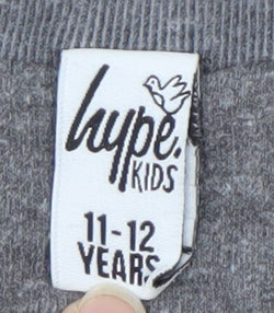 Brand and care label for Hype boys’ grey pullover sweatshirt 11-12 years graphic print