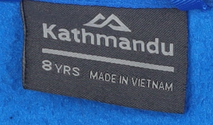 Brand and care label for Kathmandu boys’ blue basic jacket 8 years lightweight hooded