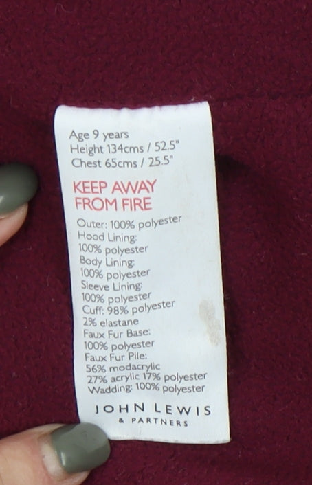 Close-up detail of John Lewis girls’ red puffer jacket 9 years