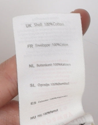 Brand and care label for SoulCal girls’ yellow polo shirt, 9-10 years, sleeveless