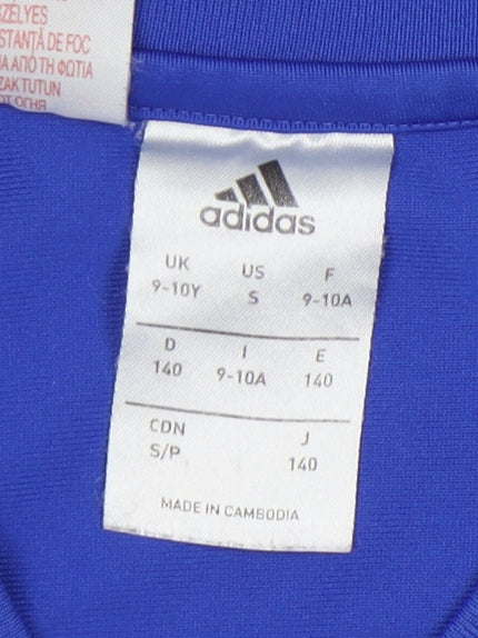 Brand and care label for Adidas boys’ blue long sleeve football t-shirt 9-10y