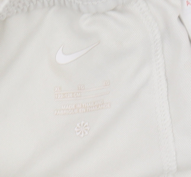 Brand and care label for Nike boys’ white athletic shorts 14-15 years football