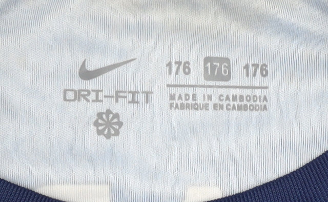 Close-up detail of Nike boys’ blue football jersey, size 16, athletic fit