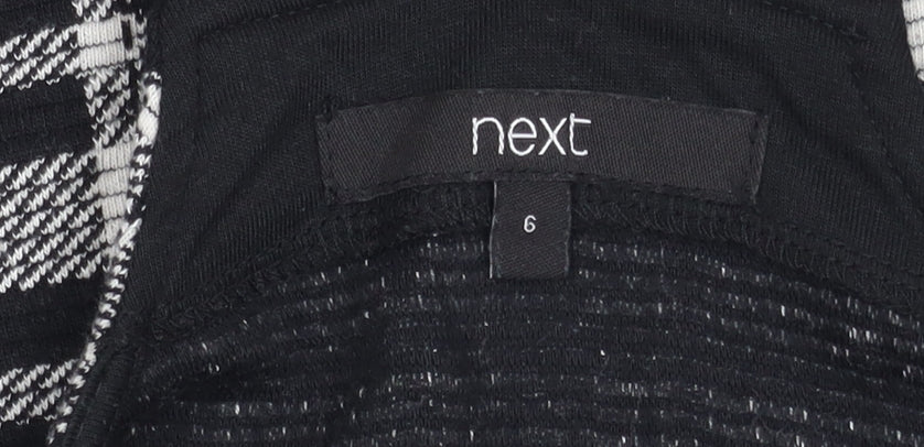 Brand and care label for Next Black Checked Pinafore Dress, size 6