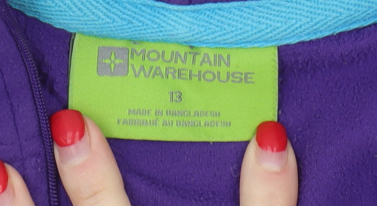 Brand and care label for Mountain Warehouse girls’ purple fleece hoodie 13 years
