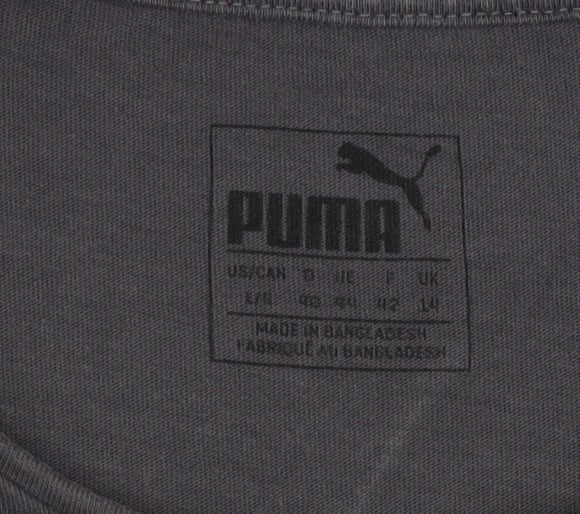 Brand and care label for Puma Women's Black T-Shirt, size 14