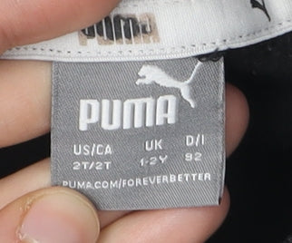 Brand and care label for Puma boys’ black crew neck logo pullover sweatshirt, 2 years