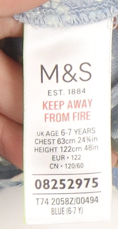 Brand and care label for Marks & Spencer girls’ blue floral camisole tank 6-7 years