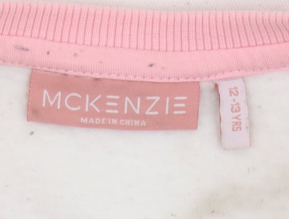 Brand and care label for McKenzie girls’ white pink sweatshirt 12-13 years logo crew neck