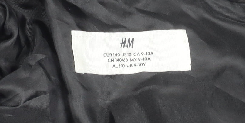 Brand and care label for H&M boys’ black puffer jacket 10 winter hooded zip