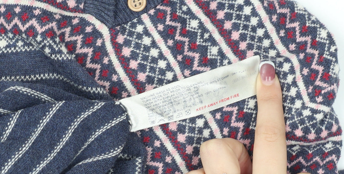 Brand and care label for Fat Face girls’ blue fair isle knit hoodie 6-7 years