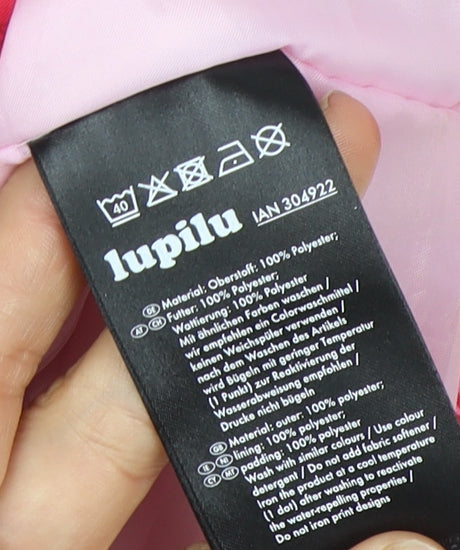 Brand and care label for Lupilu girls’' pink floral puffer jacket, 2-4 years, winter