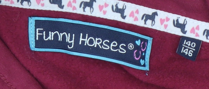 Brand and care label for Funny Horses girls’ red pullover sweatshirt 10-11 years