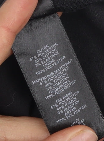 Brand and care label for Red Herring Women's Black Asymmetrical Dress, size 12