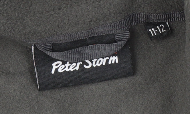 Brand and care label for Peter Storm boys’ black parka jacket, size 11-12, hooded