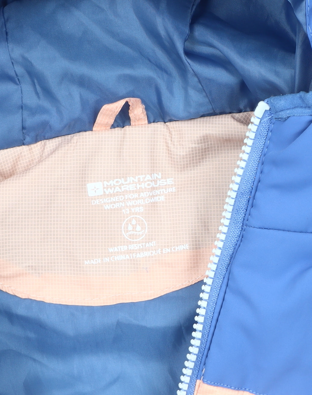 Close-up detail of Mountain Warehouse girls’ blue puffer jacket 13 years
