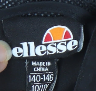 Close-up detail of Ellesse boys’' colourblock jacket black/grey/orange, size 10-11
