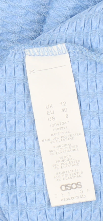 Brand and care label for ASOS DESIGN Women's Blue Wrap Blouse, size 12