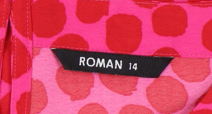 Close-up detail of Roman Women's Pink Polka Dot Blouse, size 14