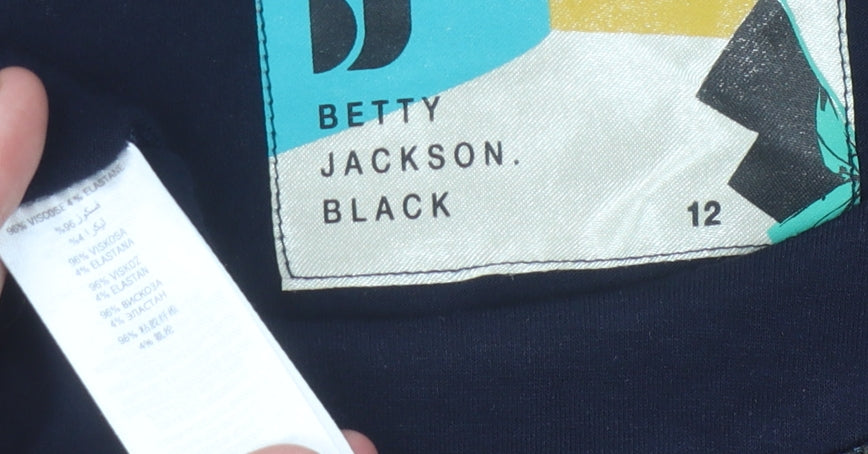 Close-up detail of Betty Jackson Women's Black 3/4 Sleeve Ruffled Top