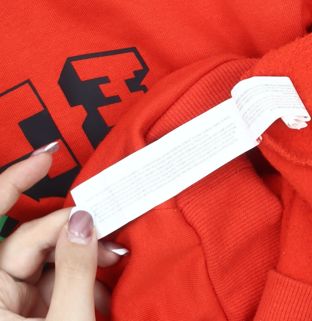 Brand and care label for Minecraft boys’ red hoodie 10-11 yrs graphic adventure mode