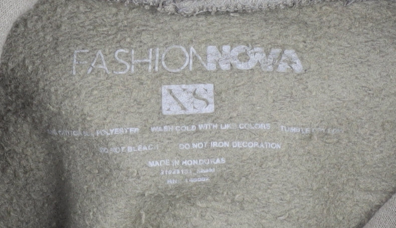 Close-up detail of Fashion Nova Men's Green XS Hoodie Pullover with Graphic
