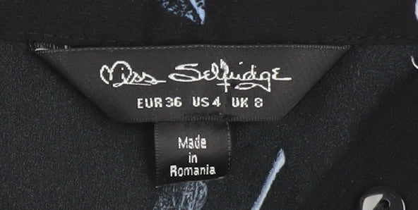 Brand and care label for Miss Selfridge Women's Floral Button-Up Shirt, UK 8
