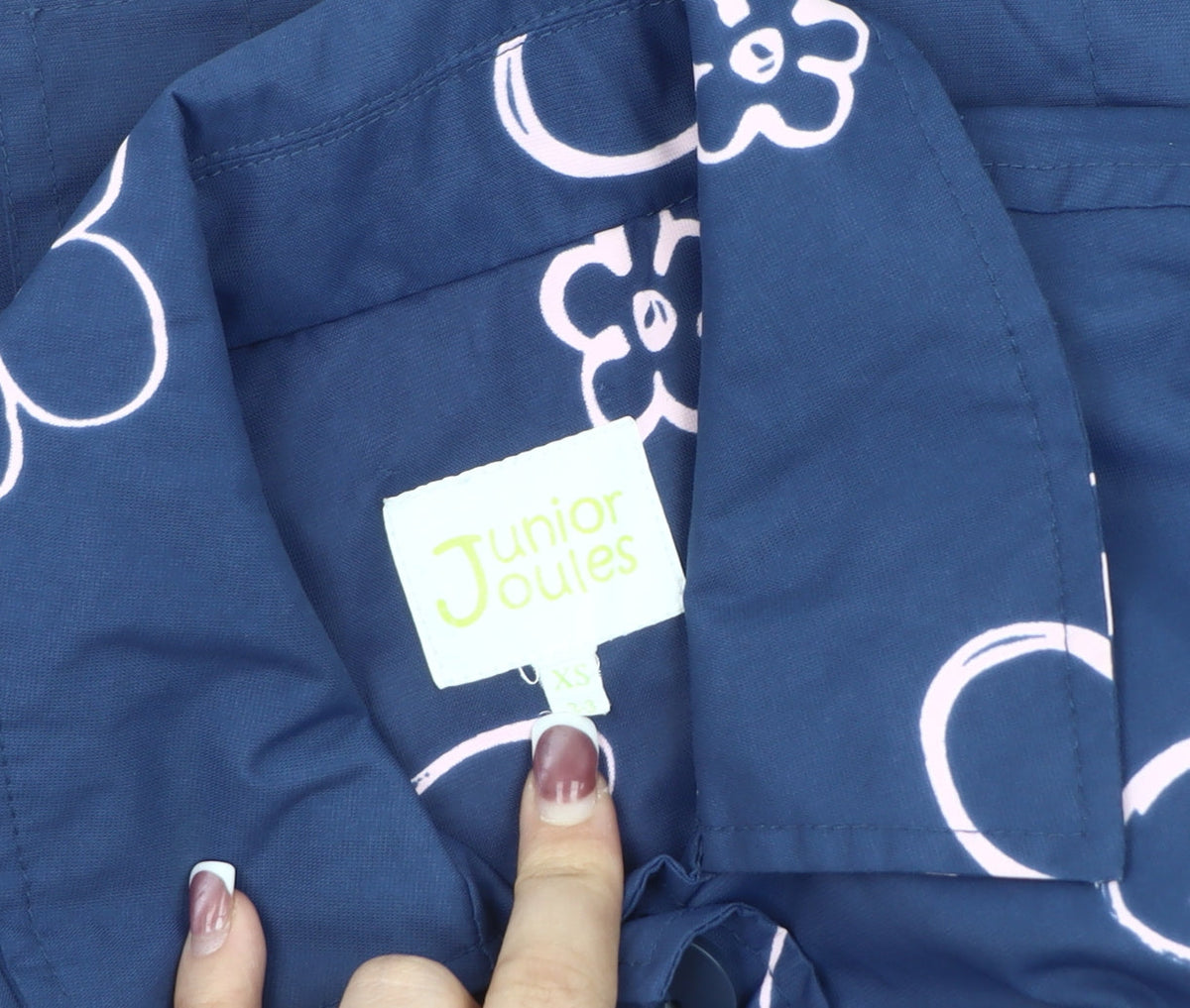 Close-up detail of Joules girls’ blue floral trench coat xs - casual spring wear