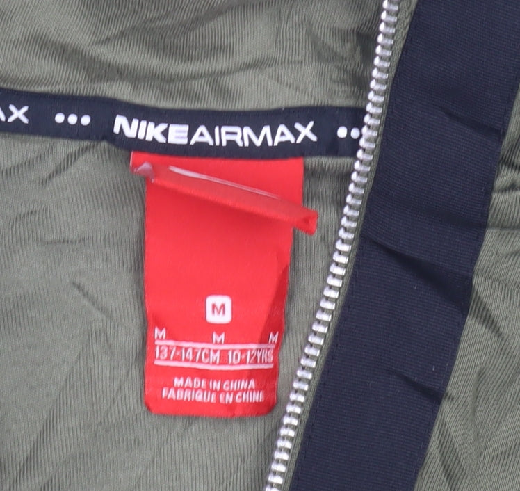 Close-up detail of Nike boys’ green full zip hoodie m - casual sportswear