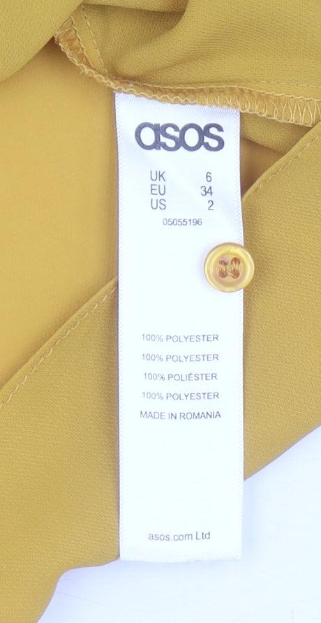 Close-up detail of ASOS Women's Yellow Blouse, size 6, Collared, Cold Shoulder