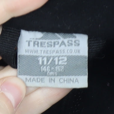 Brand and care label for Trespass boys’ black fleece jacket 11 years full zip