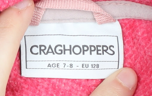 Brand and care label for Craghoppers girls’ pink colourblock fleece jacket 7-8 years
