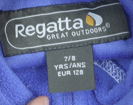 Brand and care label for Regatta girls’ purple fleece sweatshirt, 8 years